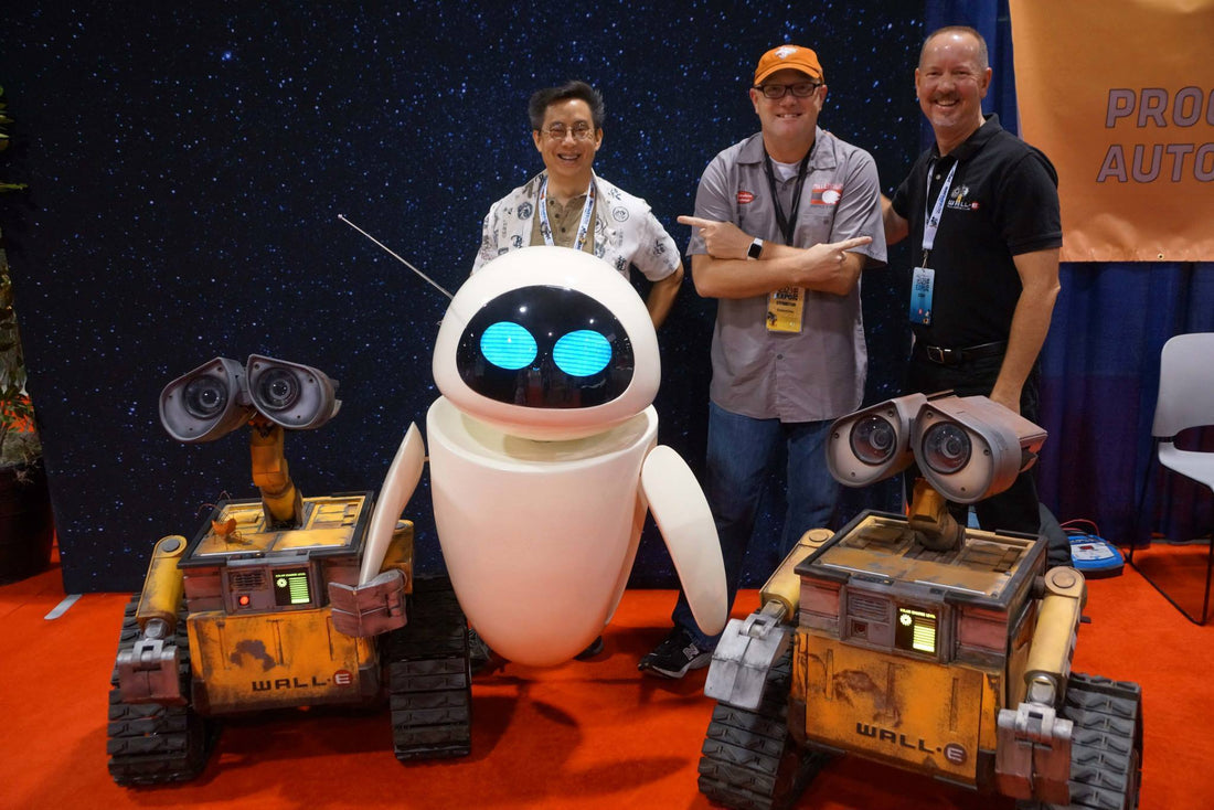 Photo of three men and three robots at Wondercon 2018